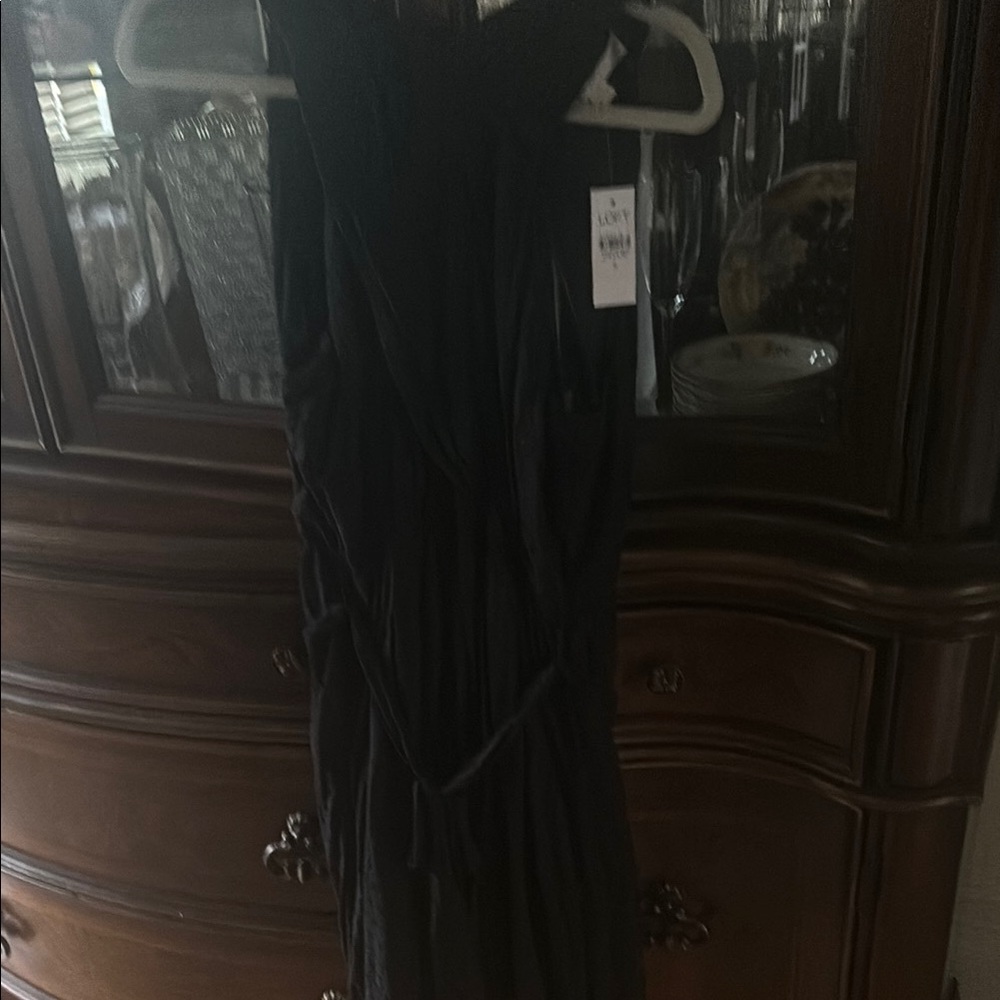 Casual black dress with Cris’s cross front new with tags